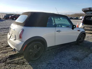 2008 MINI Convertible with VIN WMWRF33588TG18353, listed as a Copart auction lot 49401615 with 124,540 mi miles and Salvage Title. Bid and sale history available at DreamBid. Image 3.