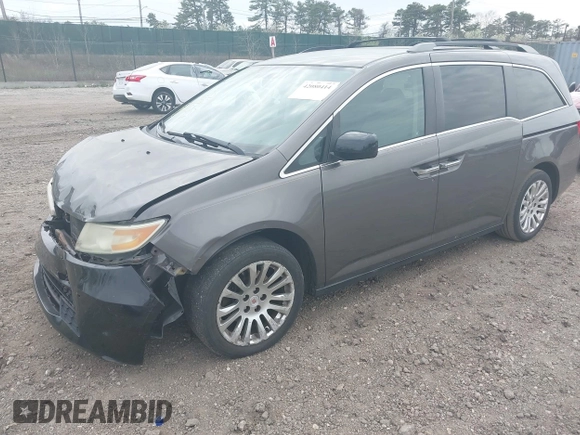 2011 Honda Odyssey EX with VIN 5FNRL5H49BB082706, listed as a IAAI auction lot 42080414 with 228,176 mi miles and . Bid and sale history available at carsss.com. Image 2.
