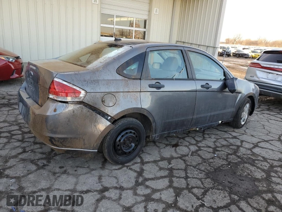 2009 Ford Focus S with VIN 1FAHP34N79W212190, listed as a Copart auction lot 44628945 with 129,568 mi miles and Salvage Title. Bid and sale history available at carsss.com. Image 3.