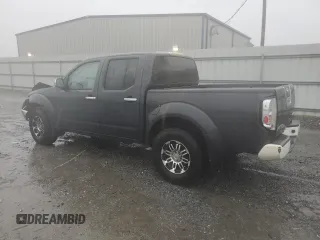 2010 Nissan Frontier SE with VIN 1N6AD0EV5AC407533, listed as a Copart auction lot 52020365 with 119,041 mi miles and Salvage title. Bid and sale history available at DreamBid. Image 2.