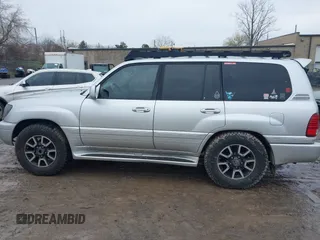 2006 Lexus LX 470 z VIN JTJHT00W364011426, wystawiony jako IAAI lot #42026869 z przebiegiem 254 659 mil mil oraz . Historia ofert i sprzedaży dostępna na DreamBid. Obrazek 14.
