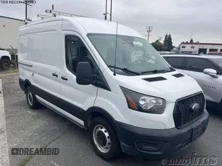 2021 Ford Transit Cargo z VIN 1FTYE1C84MKA94597, wystawiony jako IAAI lot #42704426 z przebiegiem 74 850 mil mil oraz . Historia ofert i sprzedaży dostępna na DreamBid. Obrazek 2.