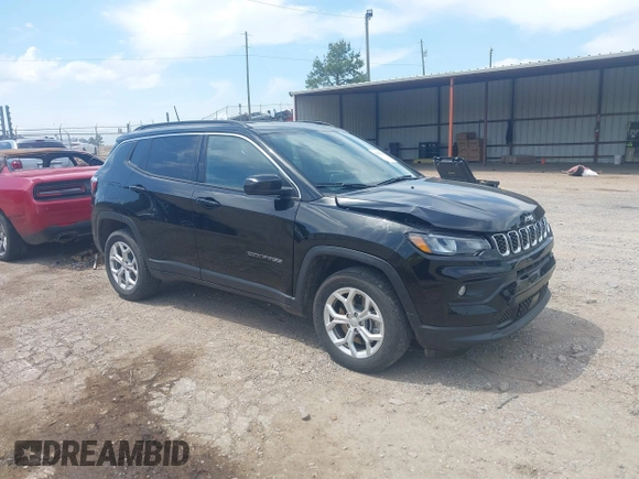 2024 Jeep Compass Latitude with VIN 3C4NJDBN4RT119513, listed as a IAAI auction lot 42153389 with 27,635 mi miles and . Bid and sale history available at carsss.com. Image 1.