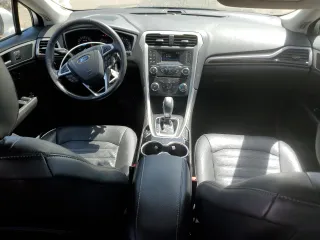 2015 Ford Fusion SE z VIN 3FA6P0HD0FR212294, wystawiony jako Copart lot #55563145 z przebiegiem 49 750 mil mil oraz Szkoda całkowita • Salvage title. Historia ofert i sprzedaży dostępna na DreamBid. Obrazek 8.