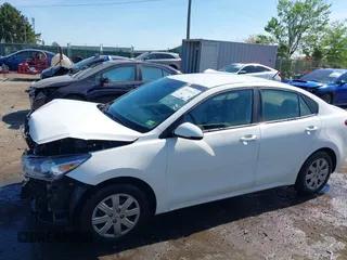 2022 Kia Rio S with VIN 3KPA24AD7NE492807, listed as a IAAI auction lot 42050520 with 100,756 mi miles. Bid and sale history available at carsss.com. Image 15.
