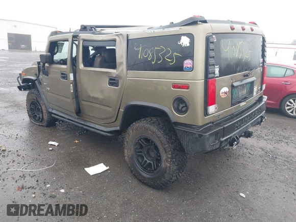 2005 Hummer H2 SUV with VIN 5GRGN23U35H130615, listed as a IAAI auction lot 41085325 with 138,393 mi miles. Bid and sale history available at carsss.com. Image 3.