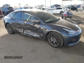2023 Tesla Model 3 z VIN 5YJ3E1EA7PF431744, wystawiony jako IAAI lot #40796119 z przebiegiem 29 801 mil mil oraz . Historia ofert i sprzedaży dostępna na DreamBid. Obrazek 1.