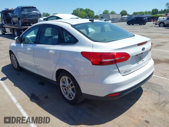 2017 Ford Focus SE with VIN 1FADP3F29HL234323, listed as a IAAI auction lot 42143821 with 138,860 mi miles. Bid and sale history available at carsss.com. Image 3.