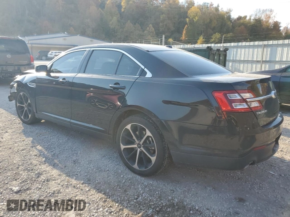 2015 Ford Taurus SEL z VIN 1FAHP2E85FG151155, wystawiony jako Copart lot #77791634 z przebiegiem 224 144 mil mil oraz Szkody całkowita. Historia ofert i sprzedaży dostępna na DreamBid. Obrazek 2.
