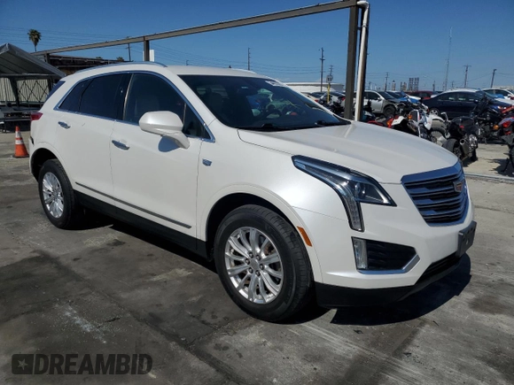 2019 Cadillac XT5 FWD with VIN 1GYKNARS1KZ121732, listed as a Copart auction lot 54882885 with 72,142 mi miles and Salvage title. Bid and sale history available at DreamBid. Image 4.