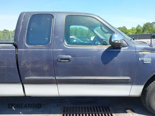 1999 Ford F-150 with VIN 1FTRX17W9XNB32397, listed as a IAAI auction lot 42048746 with 290,179 mi miles and . Bid and sale history available at DreamBid. Image 12.