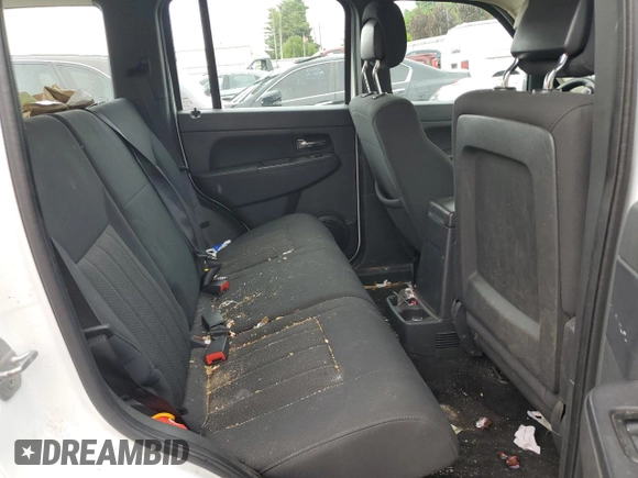 2011 Jeep Liberty Sport with VIN 1J4PN2GK0BW588379, listed as a Copart auction lot 57765655 with 137,248 mi miles and Salvage title. Bid and sale history available at DreamBid. Image 10.
