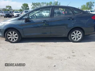 2011 Ford Fiesta SE z VIN 3FADP4BJ5BM219052, wystawiony jako IAAI lot #42297403 z przebiegiem 108 302 mil mil oraz . Historia ofert i sprzedaży dostępna na DreamBid. Obrazek 15.