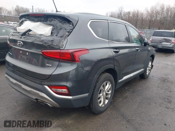 2020 Hyundai Santa Fe SE with VIN 5NMS2CAD8LH258275, listed as a IAAI auction lot 41912687 with 80,467 mi miles and . Bid and sale history available at DreamBid. Image 4.