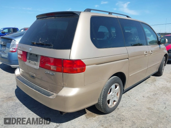 2001 Honda Odyssey EX with VIN 2HKRL18681H530346, listed as a IAAI auction lot 42371126 with 211,604 mi miles and . Bid and sale history available at DreamBid. Image 4.