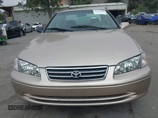 2000 Toyota Camry CE z VIN 4T1BG22K6YU620043, wystawiony jako IAAI lot #42425130 z przebiegiem 157 080 mil mil oraz . Historia ofert i sprzedaży dostępna na DreamBid. Obrazek 6.