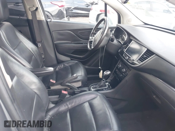 2019 Buick Encore Essence with VIN KL4CJCSM5KB835265, listed as a IAAI auction lot 41096722 with 98,859 mi miles. Bid and sale history available at carsss.com. Image 5.