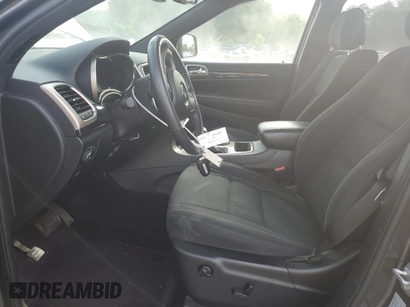 2016 Jeep Grand Cherokee 75th Anniversary with VIN 1C4RJEAG1GC506443, listed as a Copart auction lot 59874015 with 135,714 mi miles and Salvage title. Bid and sale history available at DreamBid. Image 7.