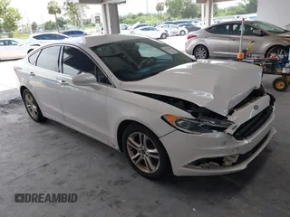 2018 Ford Fusion SE with VIN 3FA6P0HD1JR210501, listed as a IAAI auction lot 42675980 with 126,697 mi miles and . Bid and sale history available at DreamBid. Image 1.