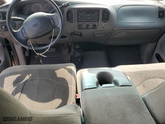 1999 Ford F-150 Work Series with VIN 1FTRX18W7XKB12844, listed as a Copart auction lot 70576044 with 0 mi miles and Salvage Title. Bid and sale history available at carsss.com. Image 8.