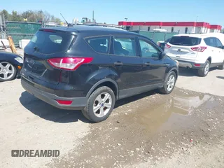 2015 Ford Escape S with VIN 1FMCU0F77FUA59064, listed as a IAAI auction lot 42073045 with 110,405 mi miles and . Bid and sale history available at DreamBid. Image 4.