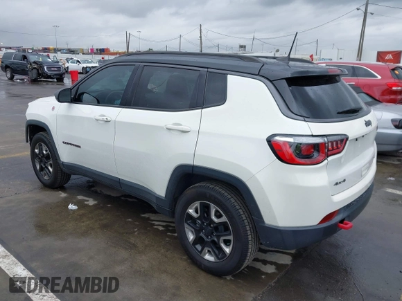 2018 Jeep Compass Trailhawk with VIN 3C4NJDDB0JT306898, listed as a IAAI auction lot 41798954 with 75,852 mi miles and . Bid and sale history available at carsss.com. Image 3.