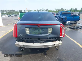 2009 Cadillac STS AWD w/1SB with VIN 1G6DD67V090151883, listed as a IAAI auction lot 42075438 with 97,408 mi miles. Bid and sale history available at carsss.com. Image 17.