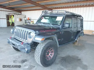 2018 Jeep Wrangler Unlimited Rubicon with VIN 1C4HJXFN1JW185914, listed as a IAAI auction lot 41360730 with 152,777 mi miles. Bid and sale history available at carsss.com. Image 17.