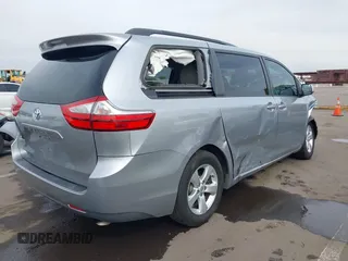 2015 Toyota Sienna LE AAS with VIN 5TDKK3DC6FS627672, listed as a IAAI auction lot 41900555 with 205,111 mi miles. Bid and sale history available at carsss.com. Image 4.