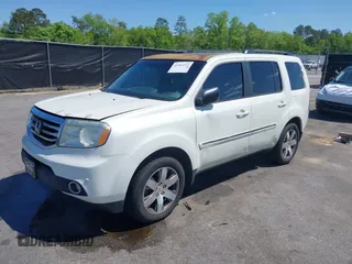 2015 Honda Pilot Touring with VIN 5FNYF3H92FB020766, listed as a IAAI auction lot 41983315 with 201,086 mi miles. Bid and sale history available at carsss.com. Image 2.