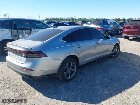 2023 Honda Accord Hybrid EX-L with VIN 1HGCY2F62PA050983, listed as a IAAI auction lot 40926361 with 63,930 mi miles. Bid and sale history available at carsss.com. Image 4.
