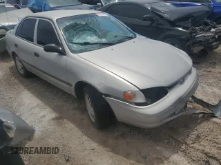 2001 Chevrolet Prizm z VIN 1Y1SK52871Z427641, wystawiony jako Copart lot #55704775 z przebiegiem Nie podano mil oraz Szkoda całkowita • Salvage title. Historia ofert i sprzedaży dostępna na DreamBid. Obrazek 4.