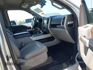 2015 Ford F-150 XLT with VIN 1FTEW1EG8FKE61864, listed as a IAAI auction lot 42120436 with 129,448 mi miles and . Bid and sale history available at DreamBid. Image 5.