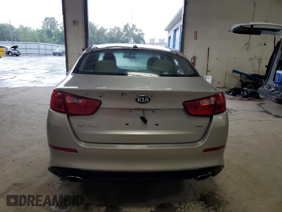 2014 Kia Optima LX z VIN KNAGM4A73E5494917, wystawiony jako Copart lot #65395515 z przebiegiem 119 259 mil mil oraz Czysty tytuł • Clean title. Historia ofert i sprzedaży dostępna na DreamBid. Obrazek 6.