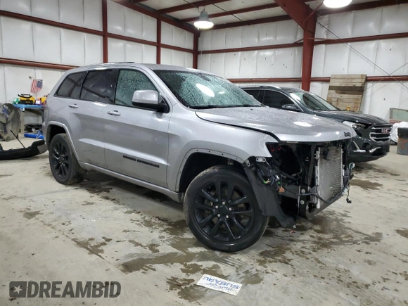 2021 Jeep Grand Cherokee Laredo E with VIN 1C4RJFAG3MC775884, listed as a Copart auction lot 52502325 with 59,368 mi miles and Salvage title. Bid and sale history available at DreamBid. Image 4.