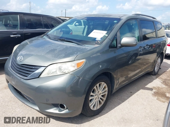 2014 Toyota Sienna XLE with VIN 5TDYK3DC2ES448876, listed as a IAAI auction lot 42519351 with 154,601 mi miles and . Bid and sale history available at DreamBid. Image 18.