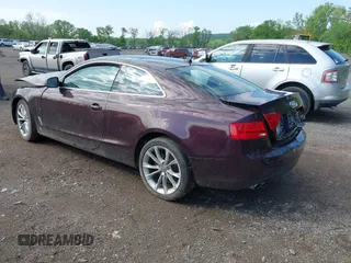 2014 Audi A5 Premium Plus with VIN WAULFAFR0EA027947, listed as a IAAI auction lot 42268709 with 195,060 mi miles and . Bid and sale history available at DreamBid. Image 3.