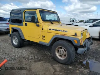 2001 Jeep Wrangler Sport z VIN 1J4FA49S01P355451, wystawiony jako Copart lot #56501545 z przebiegiem 213 027 mil mil oraz Czysty tytuł • Clean title. Historia ofert i sprzedaży dostępna na DreamBid. Obrazek 4.