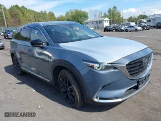 2021 Mazda CX-9 Grand Touring with VIN JM3TCBDY4M0521221, listed as a IAAI auction lot 40518124 with 36,460 mi miles. Bid and sale history available at carsss.com. Image 1.