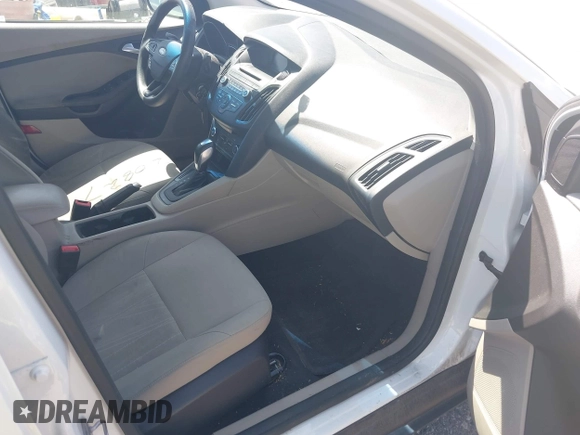 2015 Ford Focus SE z VIN 1FADP3F28FL334359, wystawiony jako IAAI lot #42520827 z przebiegiem 182 755 mil mil oraz . Historia ofert i sprzedaży dostępna na DreamBid. Obrazek 5.