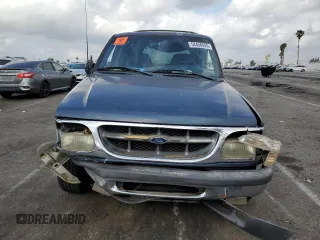 1998 Ford Explorer XL z VIN 1FMZU34EXWZA13244, wystawiony jako Copart lot #54456095 z przebiegiem 192 527 mil mil oraz Szkoda całkowita • Salvage title. Historia ofert i sprzedaży dostępna na DreamBid. Obrazek 5.