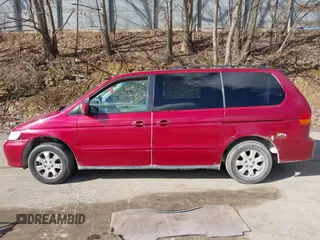 2003 Honda Odyssey EX-L with VIN 5FNRL18923B130410, listed as a IAAI auction lot 41814211 with 209,335 mi miles and . Bid and sale history available at DreamBid. Image 14.