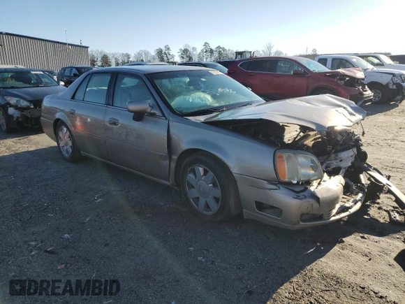 2003 Cadillac DeVille DTS z VIN 1G6KF57963U125853, wystawiony jako Copart lot #42559975 z przebiegiem Nie podano mil oraz Szkody całkowita. Historia ofert i sprzedaży dostępna na DreamBid. Obrazek 4.