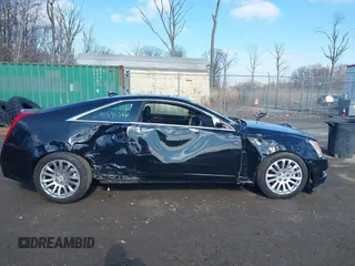2014 Cadillac CTS Premium with VIN 1G6DH1E32E0177775, listed as a IAAI auction lot 41540366 with 106,398 mi miles and . Bid and sale history available at DreamBid. Image 13.