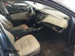 2014 Toyota Avalon Limited with VIN 4T1BK1EB1EU128987, listed as a IAAI auction lot 42034677 with 104,153 mi miles and . Bid and sale history available at DreamBid. Image 5.