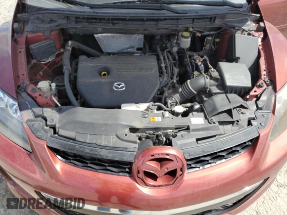 2010 Mazda CX-7 SV z VIN JM3ER2W55A0320322, wystawiony jako Copart lot #51959445 z przebiegiem 242 091 mil mil oraz Szkoda całkowita • Salvage title. Historia ofert i sprzedaży dostępna na DreamBid. Obrazek 13.