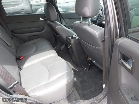 2011 Mercury Mariner with VIN 4M2CN8B7XBKJ01717, listed as a IAAI auction lot 42030587 with 115,766 mi miles. Bid and sale history available at carsss.com. Image 8.