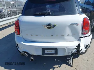 2014 MINI Countryman S with VIN WMWZC3C52EWP25060, listed as a IAAI auction lot 41642855 with 240,396 mi miles and . Bid and sale history available at DreamBid. Image 12.