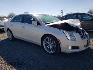 2013 Cadillac XTS Premium z VIN 2G61S5S34D9201773, wystawiony jako Copart lot #48572365 z przebiegiem 78 296 mil mil oraz Szkoda całkowita • Salvage title. Historia ofert i sprzedaży dostępna na DreamBid. Obrazek 4.