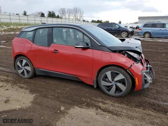2019 BMW i3 with VIN WBY8P4C58K7D50307, listed as a Copart auction lot 82934144 with 32,453 mi miles and Salvage Title. Bid and sale history available at carsss.com. Image 4.
